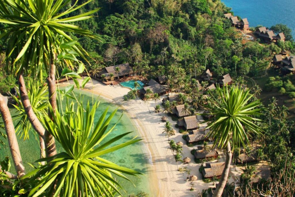 aerial view of the beach and beachfront villas with their own lagoon