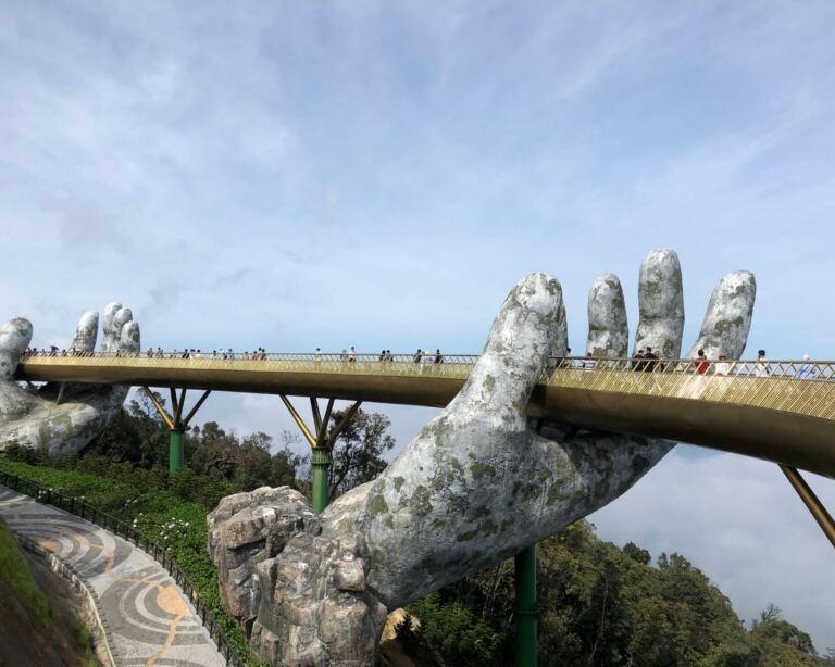 Famous tourist attraction - Golden bridge at the top of the Ba Na Hills, Vietnam.