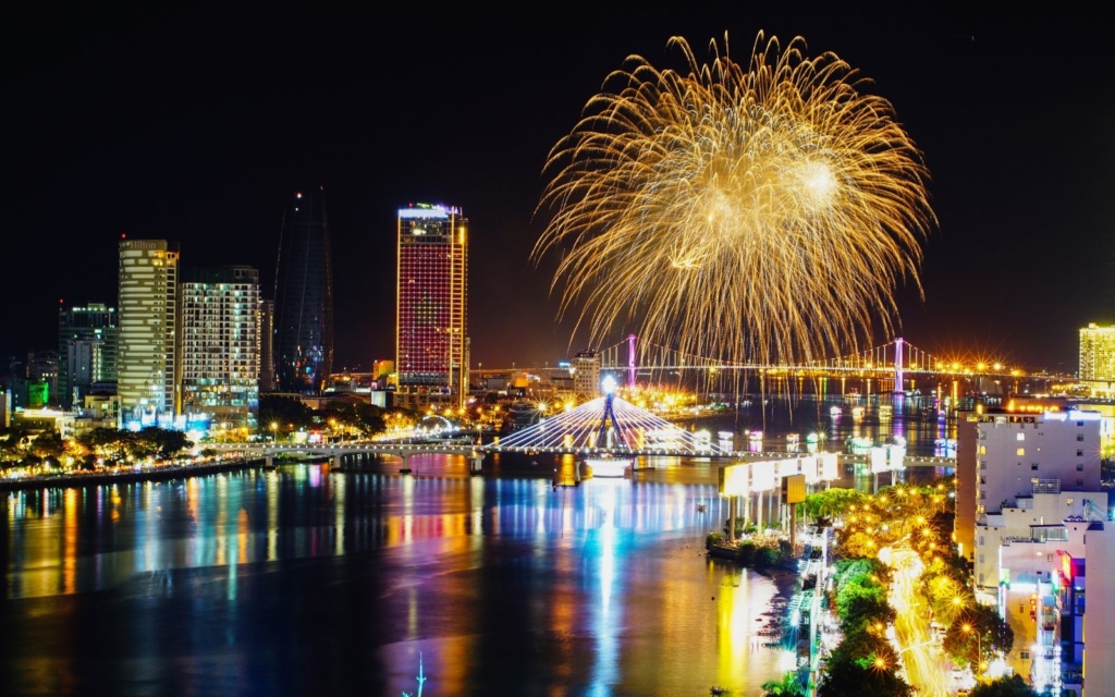 Da Nang Riverside at night with fireworks, skyscrapers, and lights