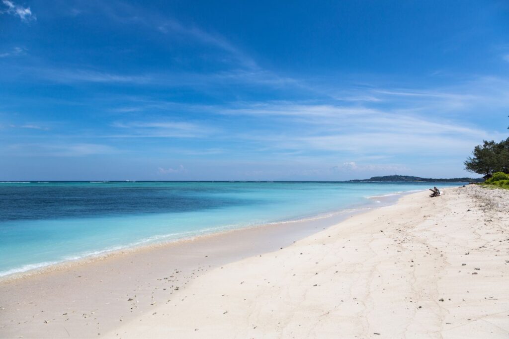 pristine beach with white sands and crystal blue waters