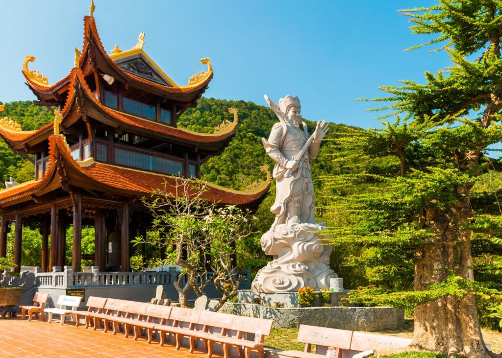 Exterior of Ho Quoc Pagoda with Buddha statue
