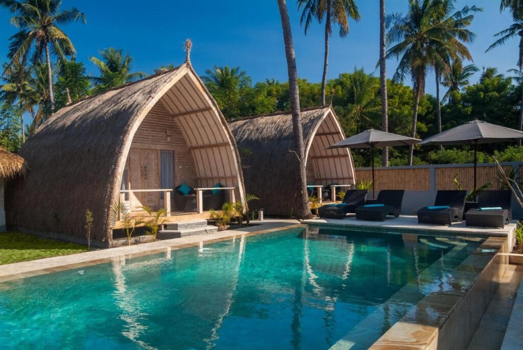cozy villas with an infinity pool surrounded by nature and coconut trees