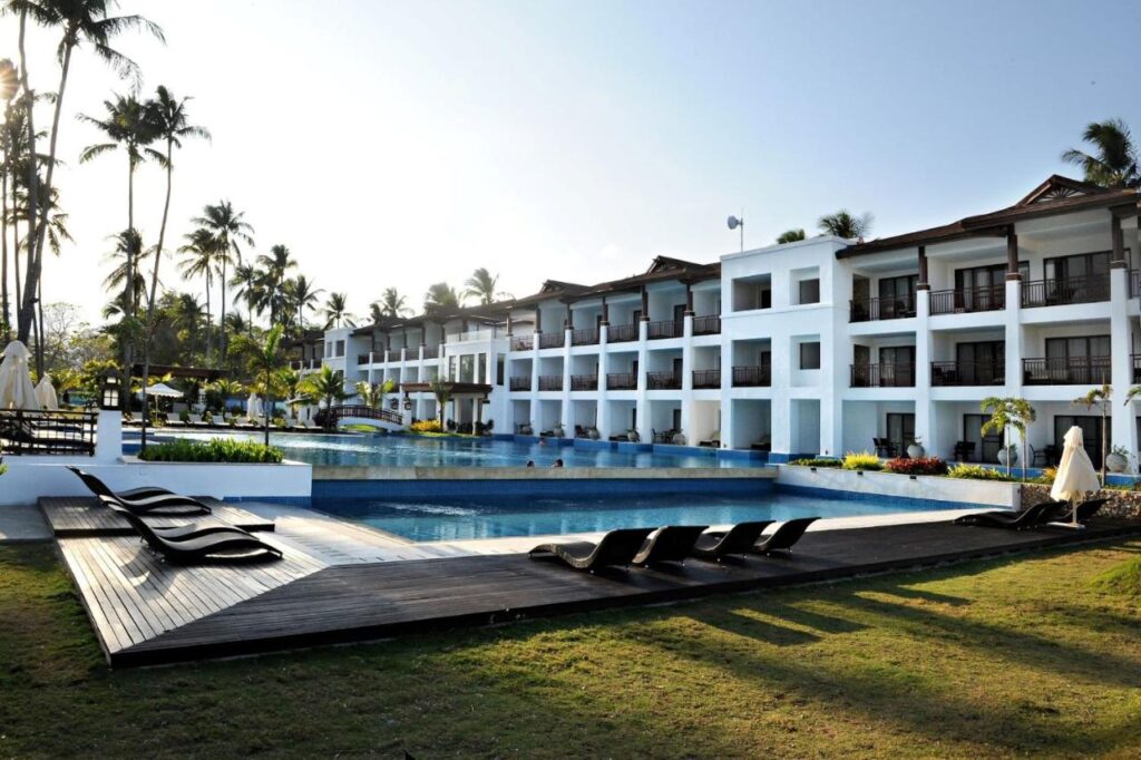 outdoor pool and hotel exterior view